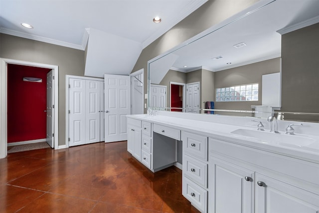 bathroom with a tub, vanity, and ornamental molding