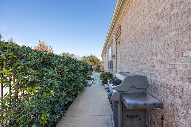 view of patio with a grill