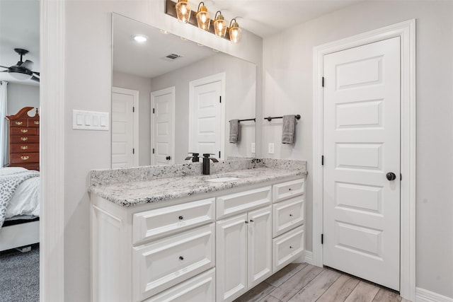 656 Calmwater Ct, Mabank, TX 75143 - ensuite bathroom featuring a ceiling fan, visible vents, vanity, baseboards, and ensuite bathroom
