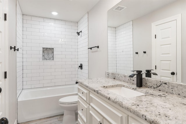 656 Calmwater Ct, Mabank, TX 75143 - bathroom featuring visible vents, vanity, wood finished floors, toilet, and shower / washtub combination
