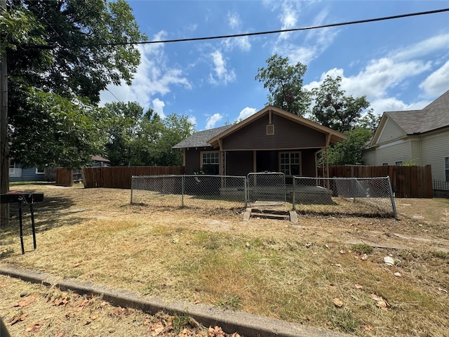 2917 Walnut St, Greenville, TX 75401 - back of house featuring a gate