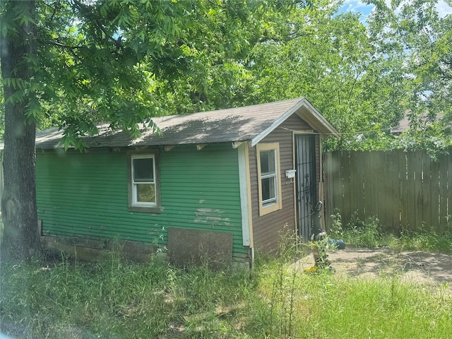 2917 Walnut St, Greenville, TX 75401 - view of outbuilding with fence and an outbuilding