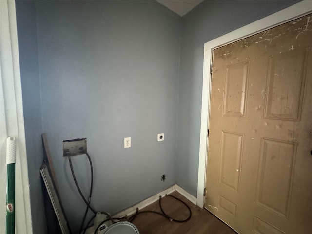 2917 Walnut St, Greenville, TX 75401 - laundry room with wood finished floors, baseboards, hookup for a washing machine, and electric dryer hookup