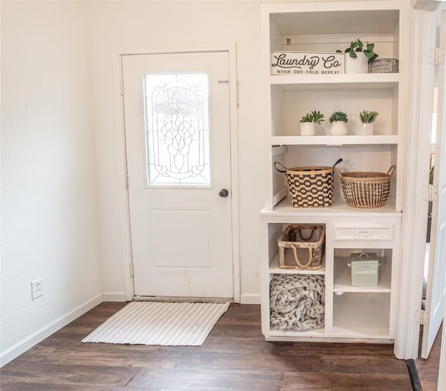 interior space with built in features and dark hardwood / wood-style flooring