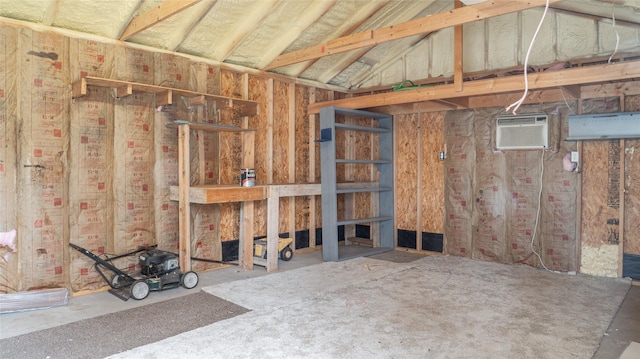 interior space featuring a wall mounted air conditioner