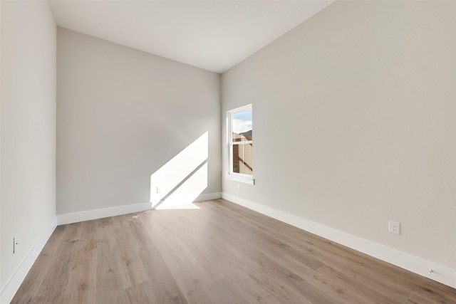 unfurnished room featuring light hardwood / wood-style floors