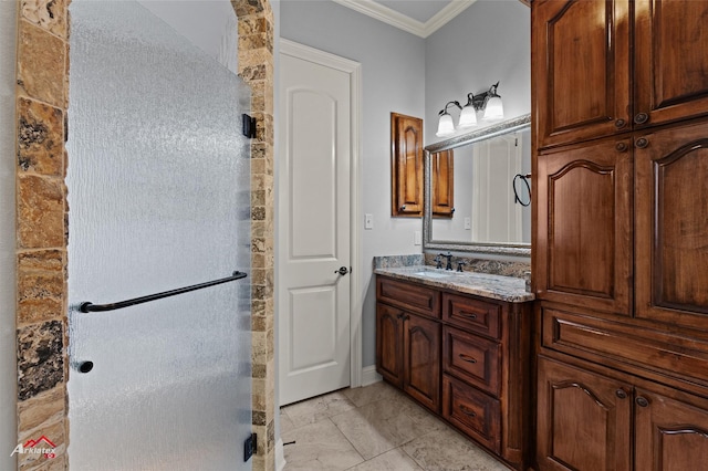 bathroom with vanity, crown molding, and a shower with door