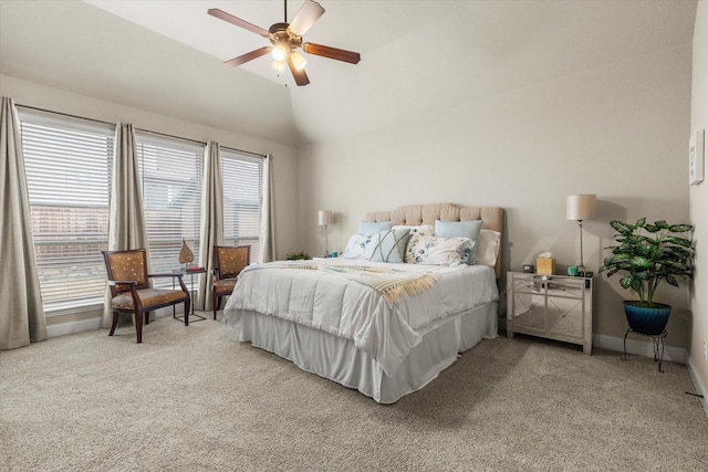 bedroom with lofted ceiling, ceiling fan, and carpet flooring