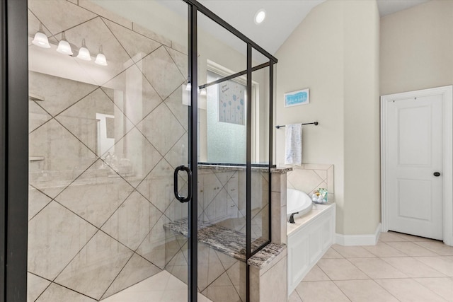 bathroom featuring tile patterned flooring and shower with separate bathtub