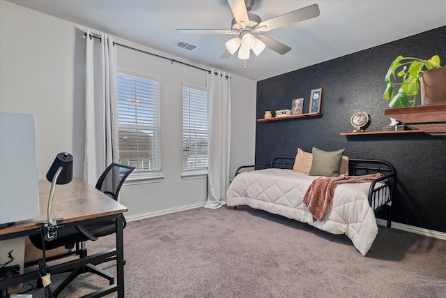 carpeted bedroom featuring ceiling fan