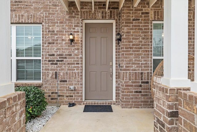 10012 Travis Dr, Providence Village, TX 76227 - doorway to property featuring brick siding