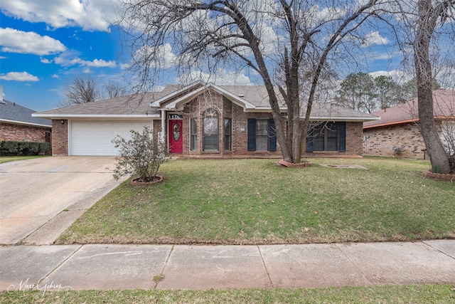 ranch-style home featuring a garage and a front lawn