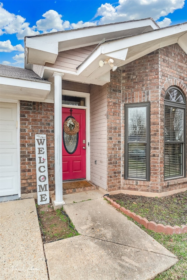 entrance to property with a garage