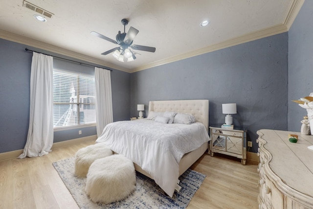 788 Windsong Ln, Rockwall, TX 75032 - bedroom with light wood-type flooring, ornamental molding, baseboards, and a ceiling fan