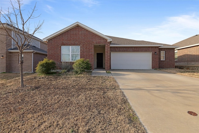 ranch-style house featuring a garage