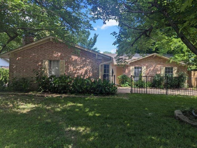 2732 Foxcroft Cir, Denton, TX 76209 - view of front facade featuring brick siding and a chimney