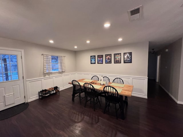 2732 Foxcroft Cir, Denton, TX 76209 - dining area with wood finished floors, recessed lighting, wainscoting, and a decorative wall
