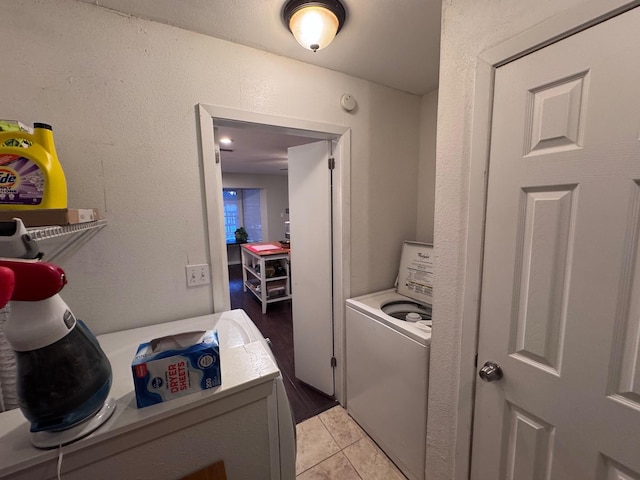 2732 Foxcroft Cir, Denton, TX 76209 - clothes washing area featuring light tile patterned flooring and independent washer and dryer