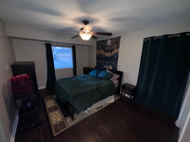 2732 Foxcroft Cir, Denton, TX 76209 - bedroom with wood finished floors and ceiling fan