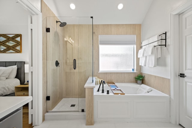 bathroom with vanity and independent shower and bath