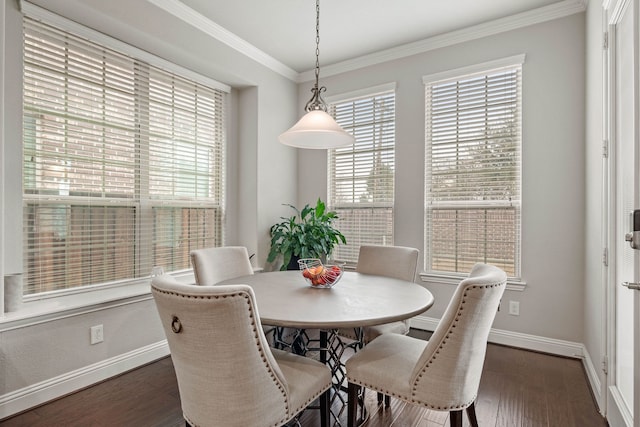 dining area with baseboards, ornamental molding, and dark wood-style flooring