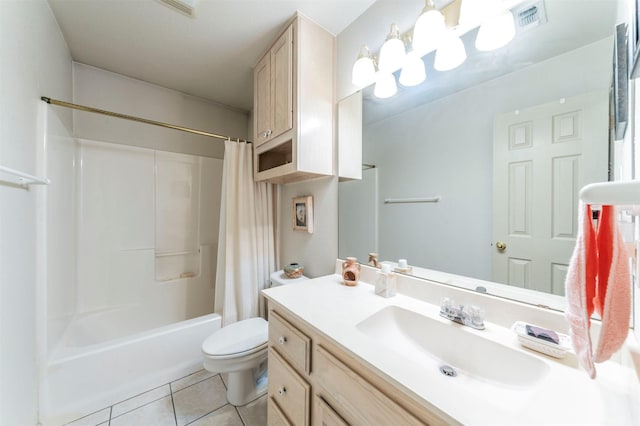 full bathroom featuring toilet, vanity, tile patterned flooring, and shower / bath combo with shower curtain