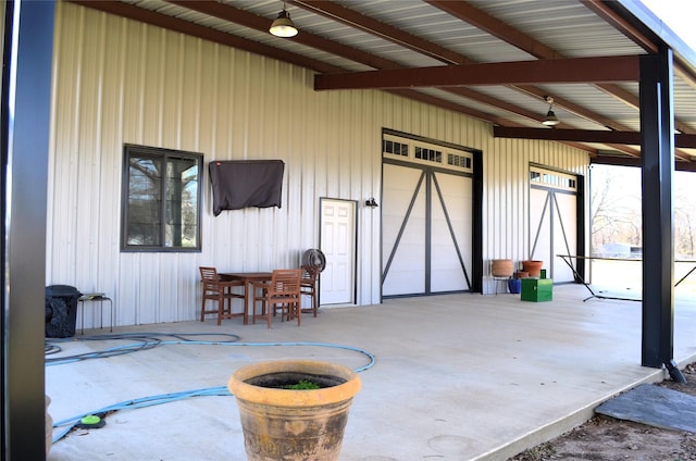 view of patio / terrace featuring ceiling fan