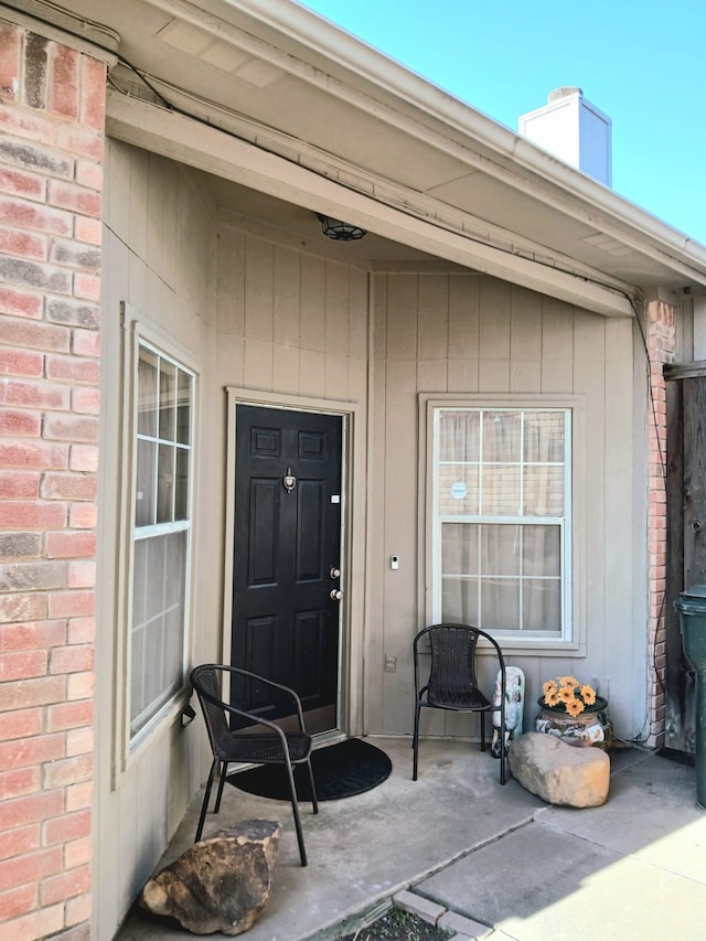 doorway to property featuring a patio