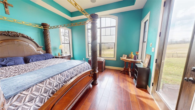 bedroom with wood-type flooring