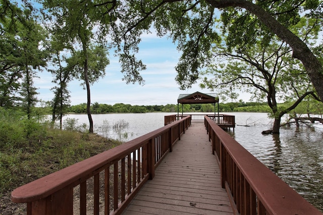 view of dock featuring a water view and a gazebo