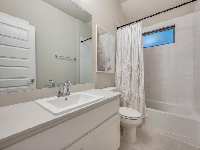 full bathroom with tile patterned floors, vanity, shower / tub combo with curtain, and toilet