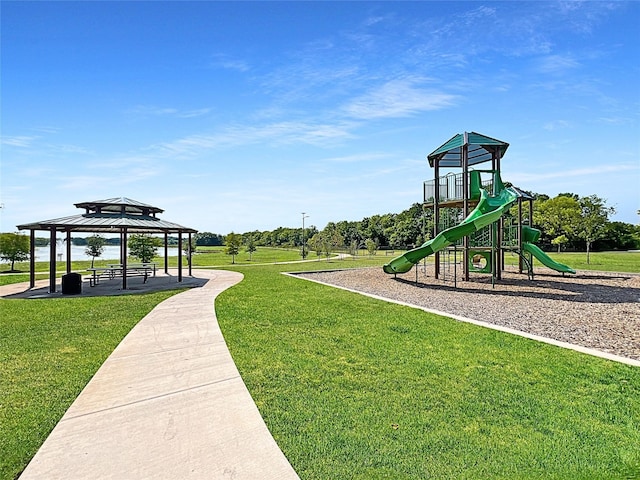 view of play area with a gazebo and a lawn