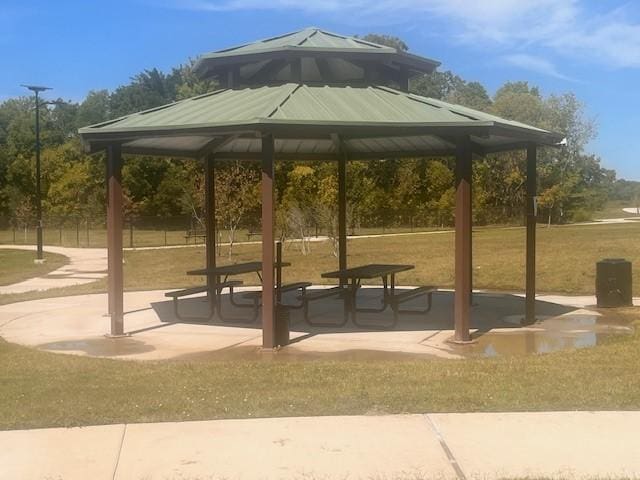 surrounding community featuring a yard and a gazebo