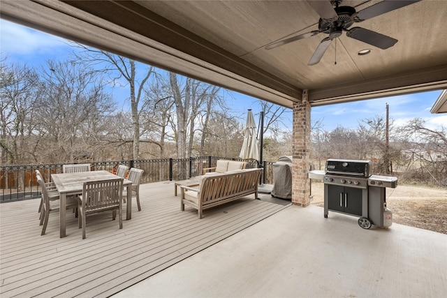 deck with ceiling fan, grilling area, outdoor dining area, and outdoor lounge area