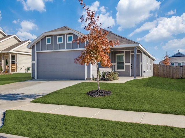 view of front facade with a front lawn and a garage