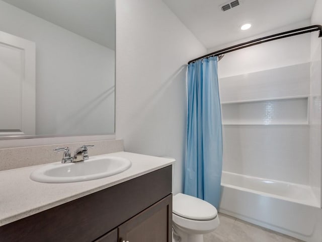 full bathroom with shower / bathtub combination with curtain, vanity, toilet, and tile patterned floors