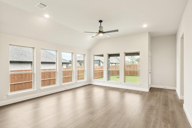 112 Woodlands Way, Balch Springs, TX 75181 - unfurnished sunroom with baseboards, wood finished floors, vaulted ceiling, and recessed lighting
