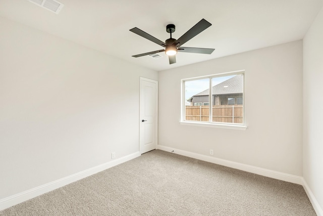 112 Woodlands Way, Balch Springs, TX 75181 - empty room featuring baseboards, light colored carpet, and ceiling fan