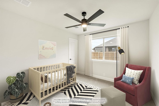 112 Woodlands Way, Balch Springs, TX 75181 - carpeted bedroom with baseboards, a crib, and a ceiling fan