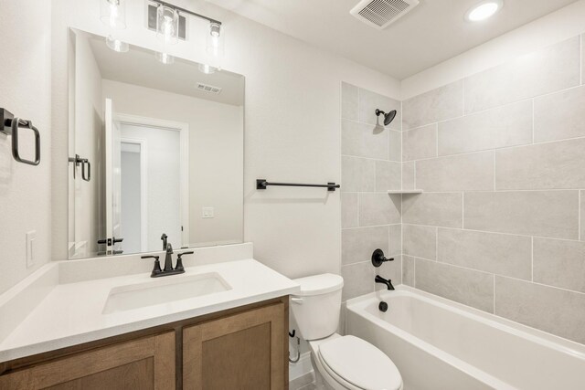 112 Woodlands Way, Balch Springs, TX 75181 - full bathroom featuring toilet, vanity, shower / tub combination, and recessed lighting
