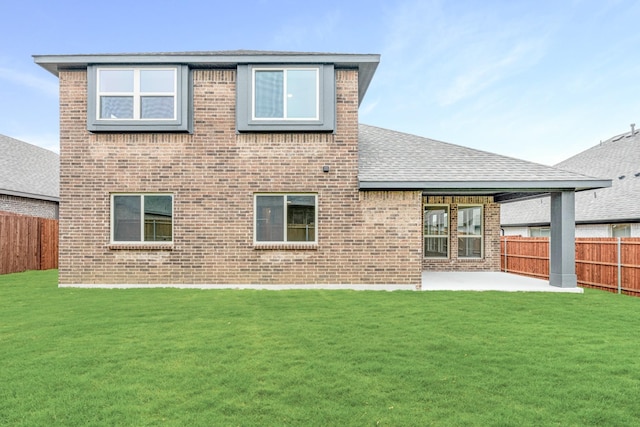 112 Woodlands Way, Balch Springs, TX 75181 - rear view of house featuring brick siding, a patio area, and a shingled roof