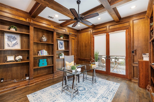 office space featuring beamed ceiling, french doors, coffered ceiling, and wooden walls