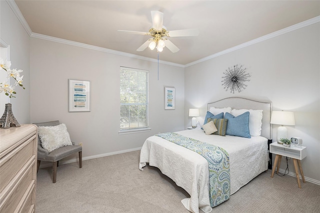 bedroom featuring light carpet, crown molding, and ceiling fan