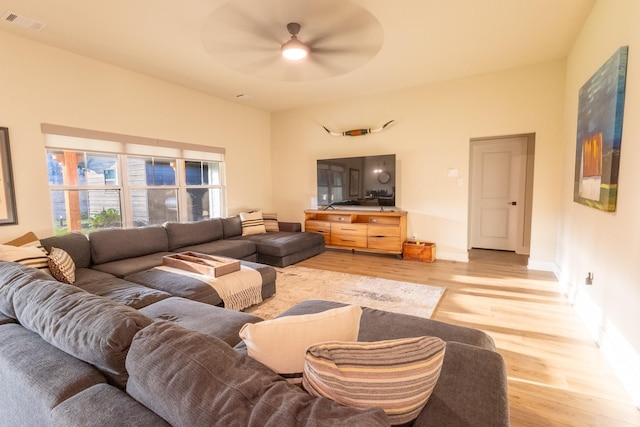 2040 Bluff Creek Dr, Strawn, TX 76475 - living area with a ceiling fan, baseboards, visible vents, and light wood-style floors