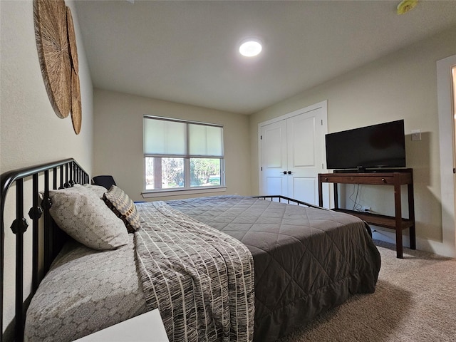 bedroom featuring carpet