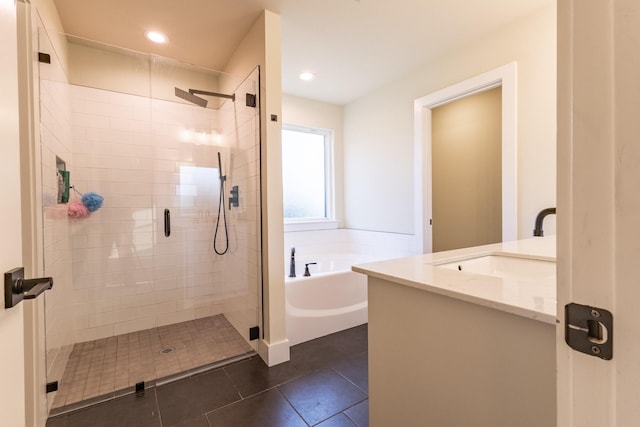 2040 Bluff Creek Dr, Strawn, TX 76475 - full bathroom with a garden tub, tile patterned flooring, a shower stall, vanity, and recessed lighting