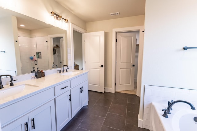 2040 Bluff Creek Dr, Strawn, TX 76475 - bathroom with a sink, a bath, a stall shower, and double vanity