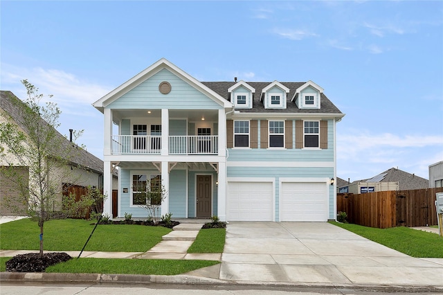 5038 Duck Cove Cir, Royse City, TX 75189 - view of front of home with a balcony, driveway, covered porch, and an attached garage