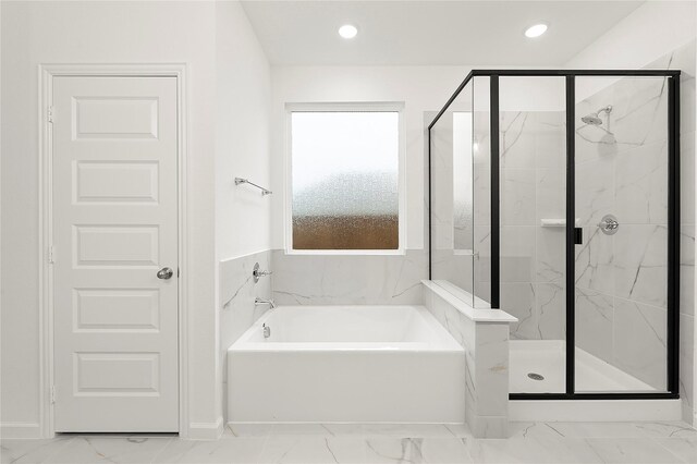 5038 Duck Cove Cir, Royse City, TX 75189 - full bathroom featuring marble look tile flooring, a shower stall, a garden tub, and recessed lighting