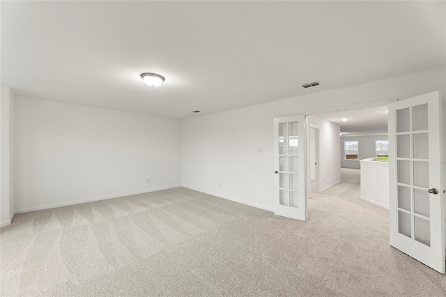 5038 Duck Cove Cir, Royse City, TX 75189 - unfurnished room with french doors, light carpet, and baseboards